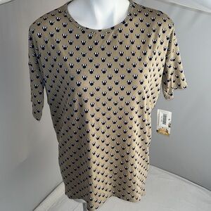Lularoe Disney Minnie Mouse print olive tan navy Irma short sleeve shirt